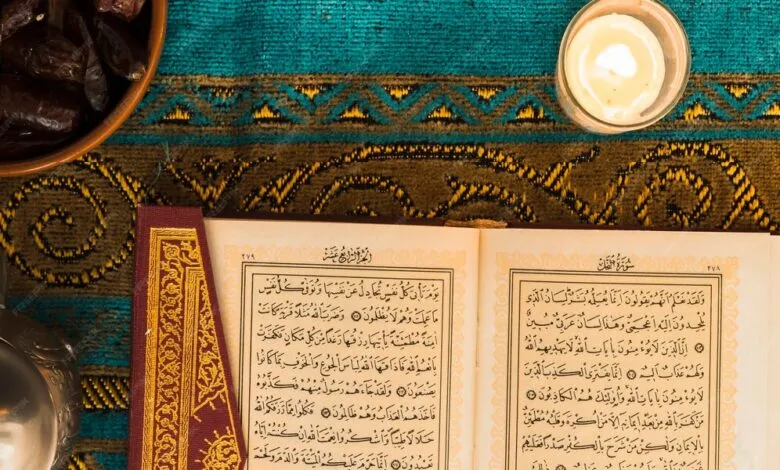 close up candle near quran 23 2147868945