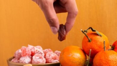 close up hand holding dehydrated fruit chinese new year 23 2148358128