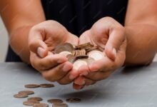 man holding coins palm 176474 7162