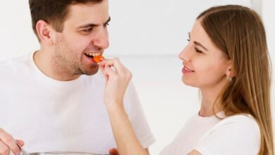 woman feeding man 23 2148535200