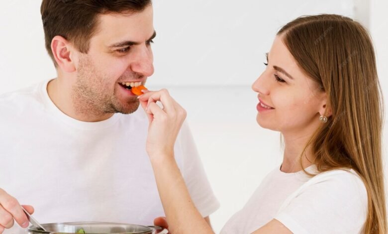 woman feeding man 23 2148535200